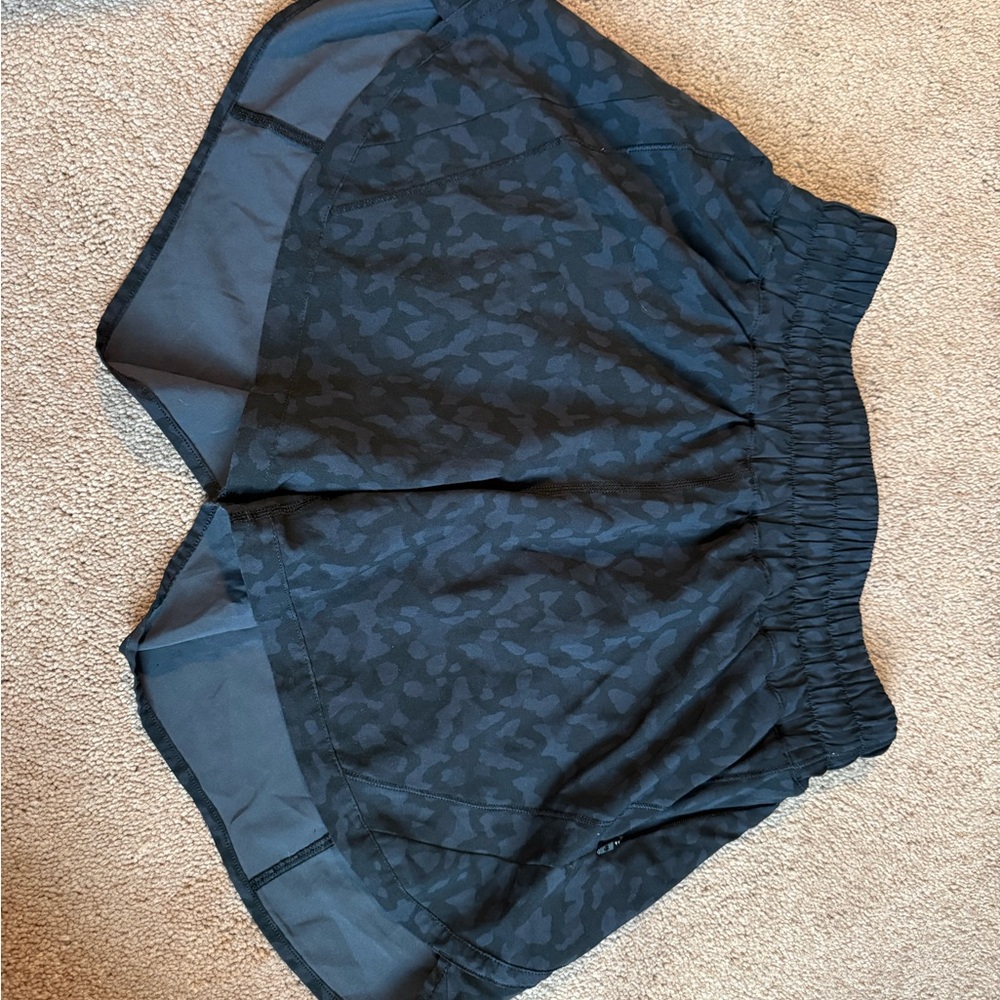 Black Athletic Shorts with Subtle Pattern - image 1